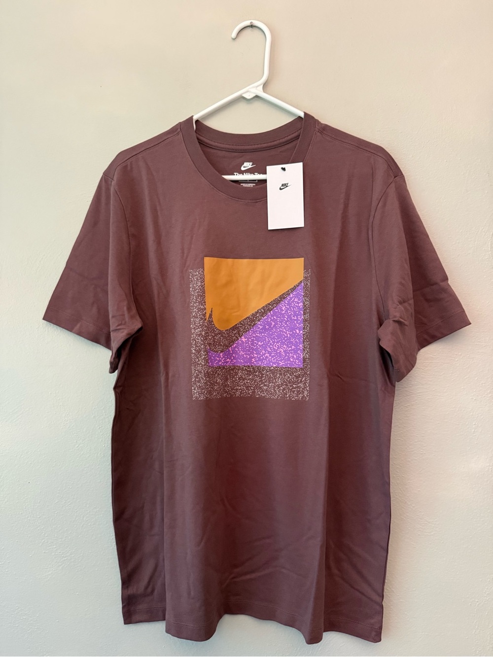 Nike Men's Mauve Short-Sleeve Graphic Tee with Orange & Purple Swoosh